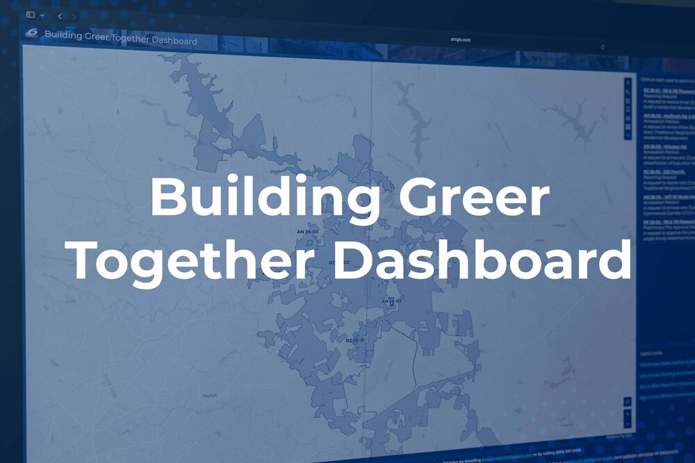 Picture of a computer screen with a mapping application pulled up and the text: "Building Greer Together Dashboard"