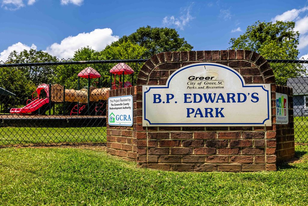 B.P. Edwards Sign with Playground in Background