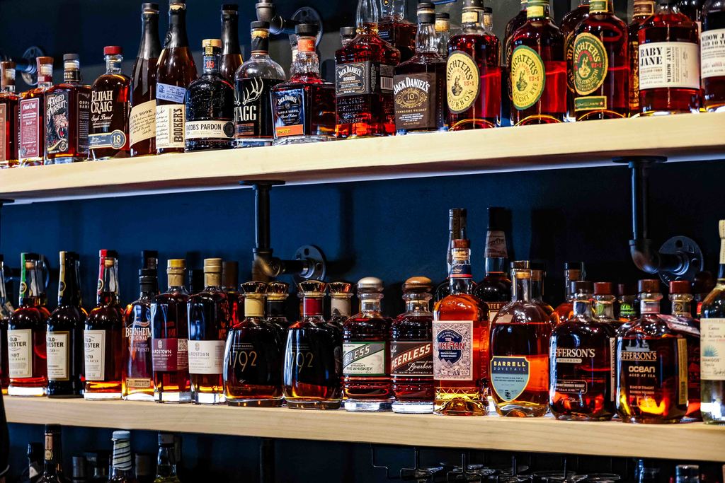 Close Up of Different Bourbons on Shelf