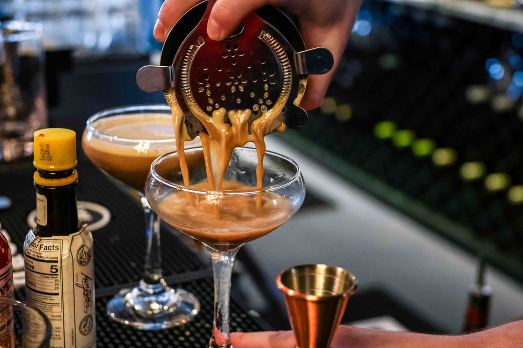 Neat Bourbon Bartender Creates Mixed Drink