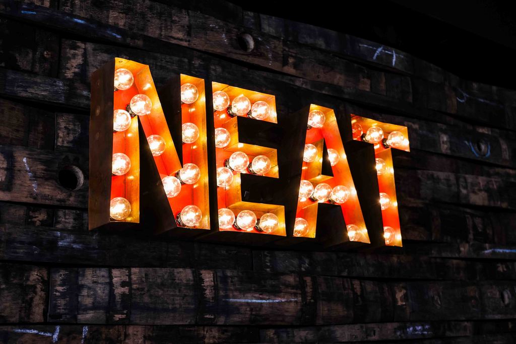 NEAT Sign inside Neat Bourbon Bar