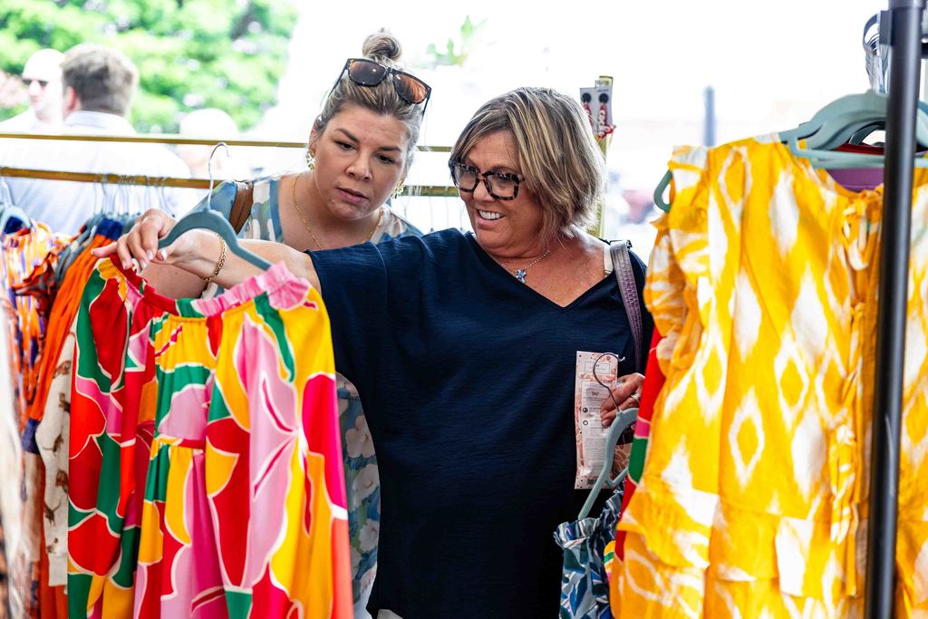 Customers Look at Clothes at Southern Sisters Boutique
