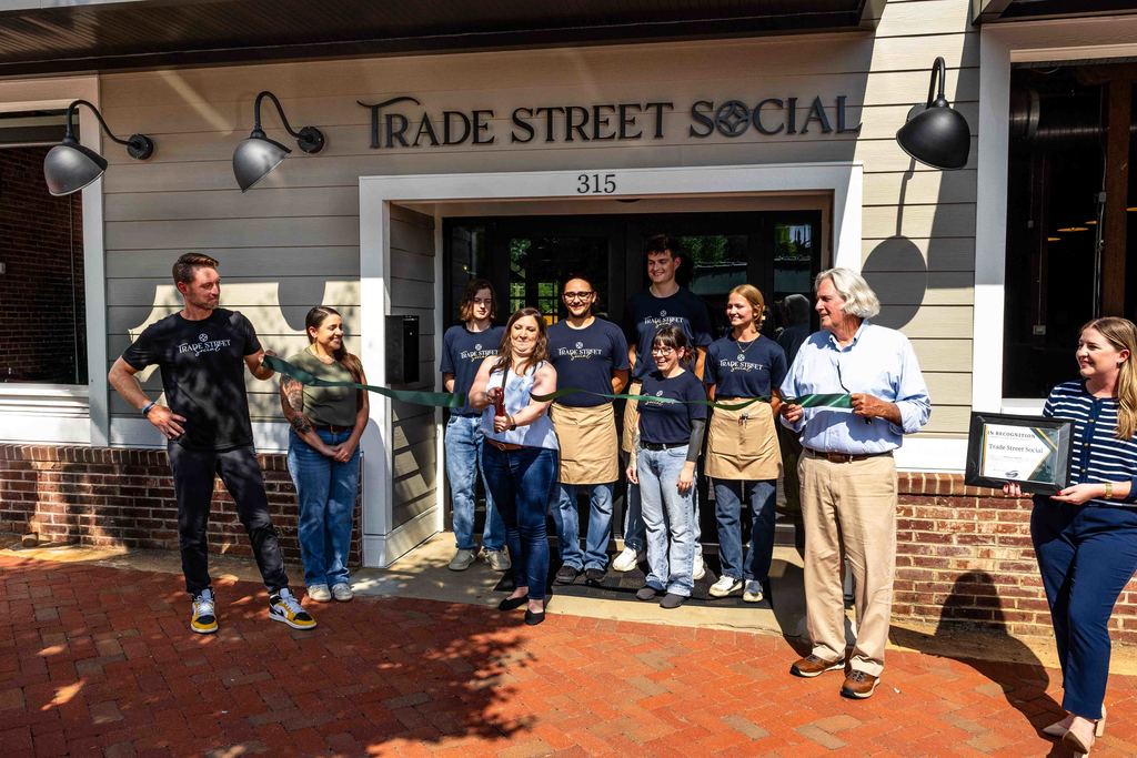 The Ribbon is cut during Trade Street Social Ribbon Cutting