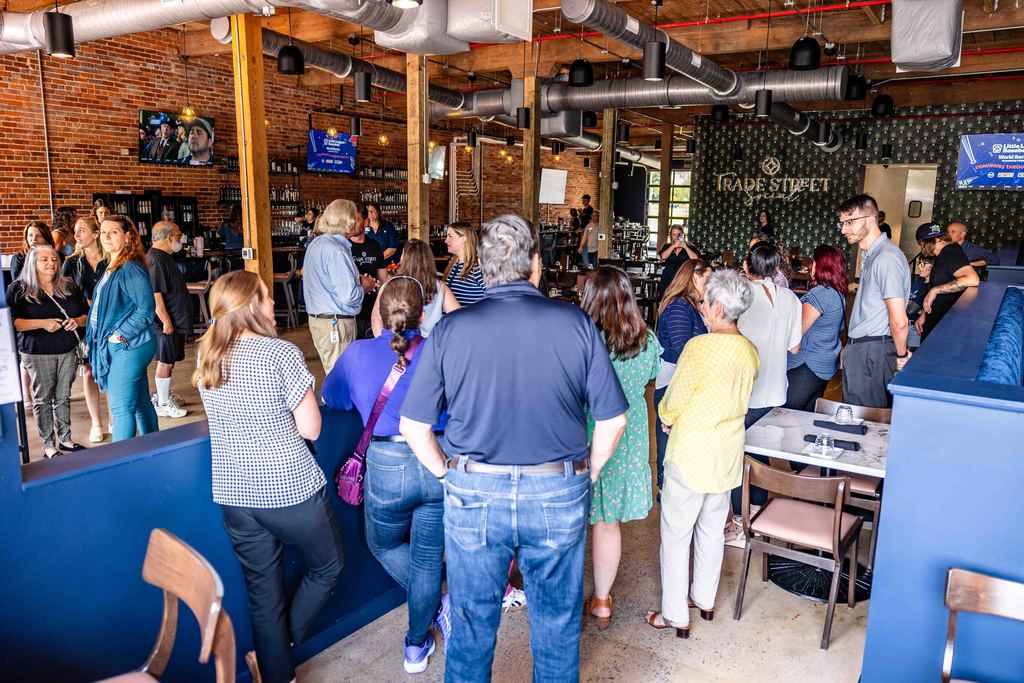 Wide Shot Showing Packed Trade Street Social for Ribbon Cutting