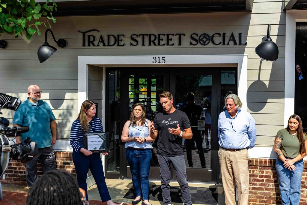 Owners Speak During Trade Street Social Ribbon Cutting