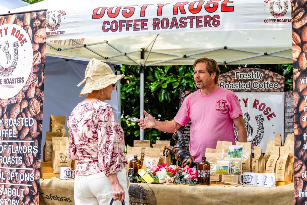 Greer Farmers Market Vendor Talks to Customer