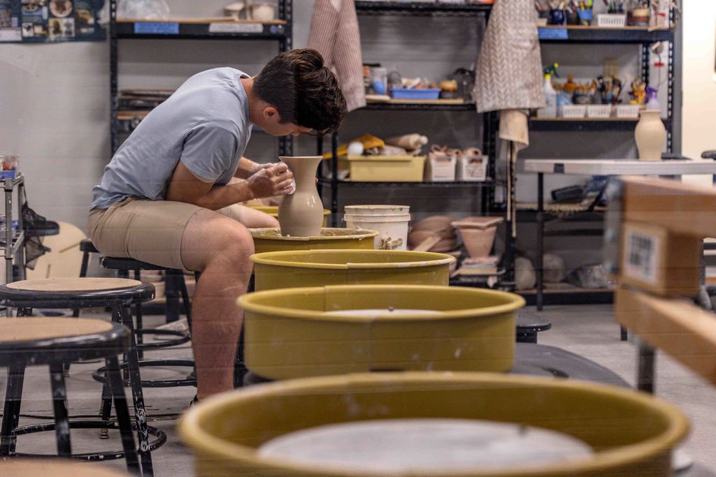 Pottery Maker Shapes Pot