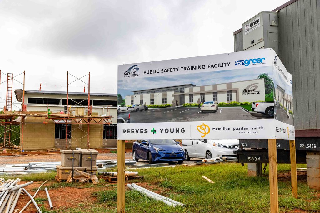 sign with rendering of finished training facility