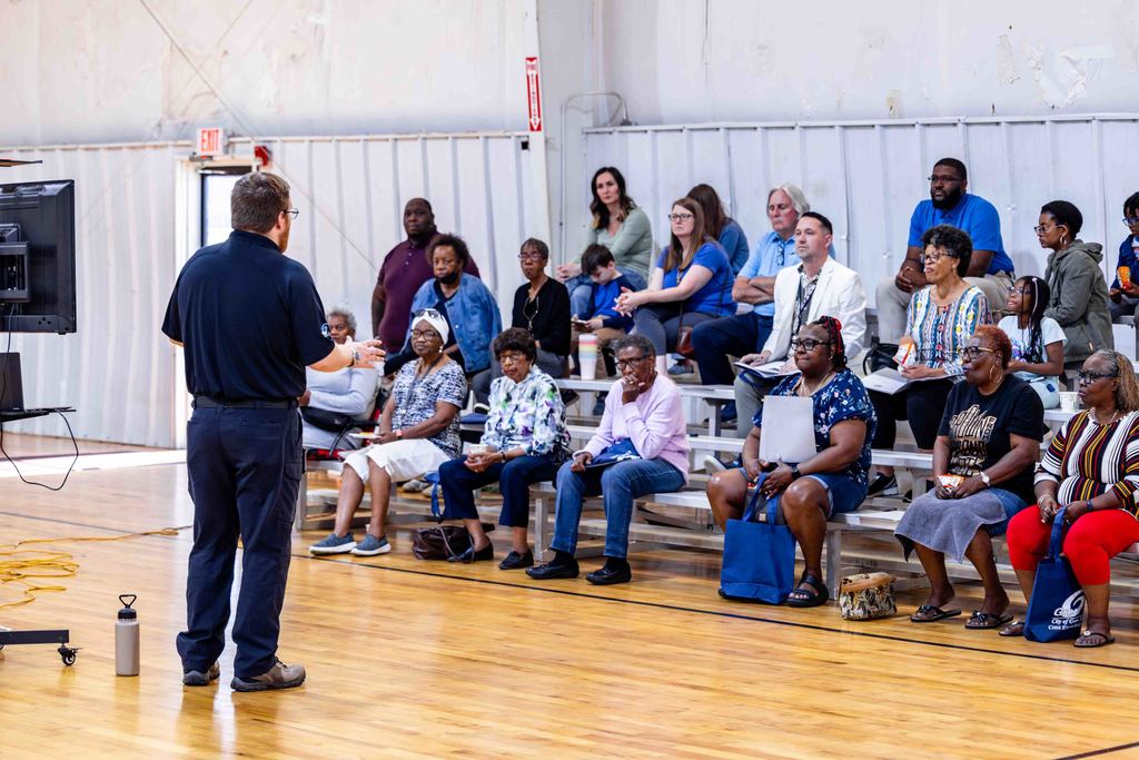 code enforcement officer addresses community engagement meeting attendees