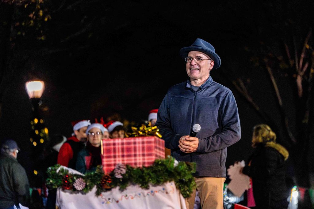 Greer150 Reveal at Greer Christmas Tree Lighting - Museum Director David Lovegrove smiles at Mayor Danner