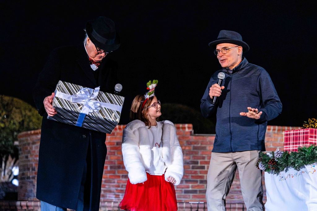 Greer150 Reveal at the Greer Christmas Tree Lighting - Mayor Danner, the Mayor's Granddaughter, and Museum Director David Lovegrove on stage