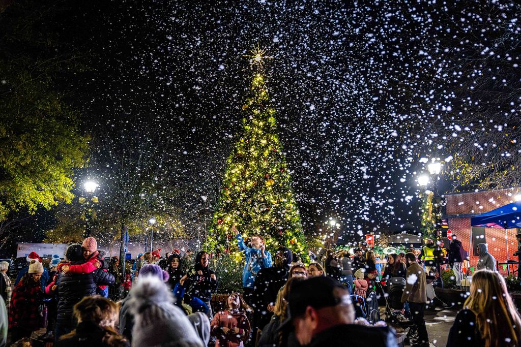 Shot of crowd at Greer Christmas Tree Lighting with Christmas Tree in the Background