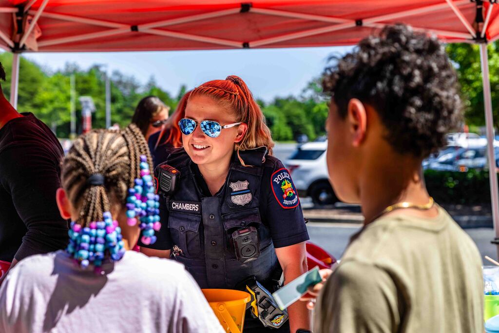 police officer talking to kids
