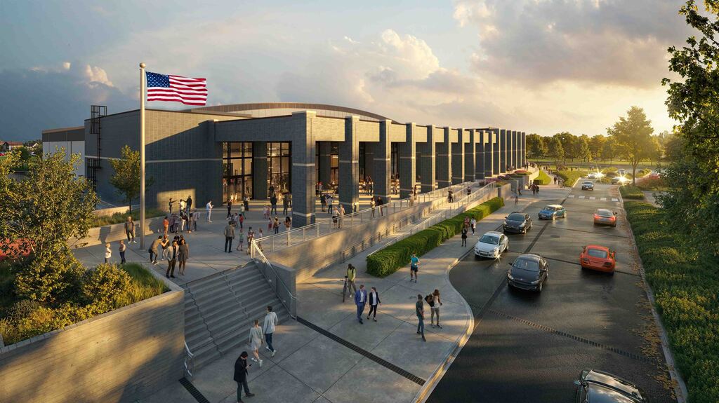 Image is a rendering of the Prisma Health Performance Center that depicts what the completed facility will look like, an American flag flying in the courtyard, the driveway off Highway 14, and artistic recreations of cars and people