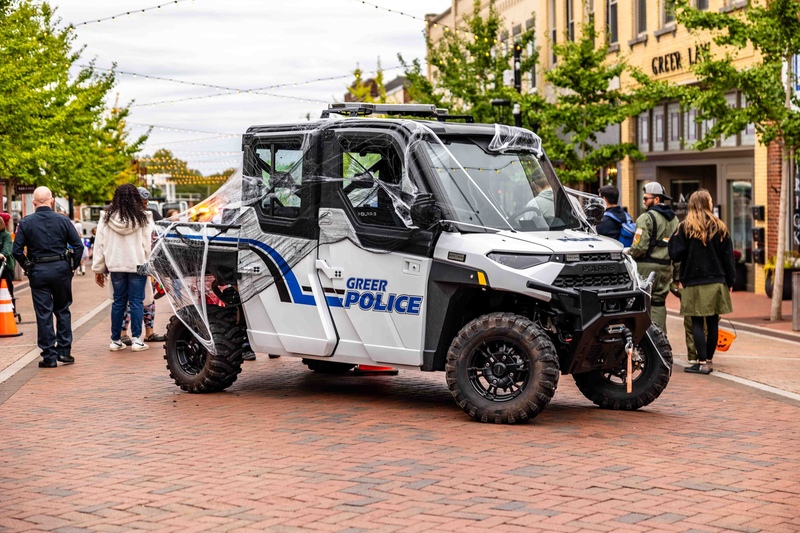 Greer Police ATV parked in the middle of Trade St. and decorated with spider webs