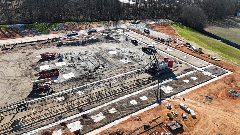 Wide shot of the big crane on the Sports and Events Center site