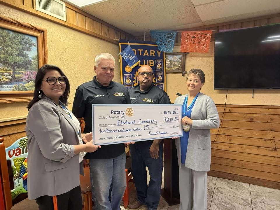 Jorge Guzman, Parks' Director & Jack Peck, Cemetery Sexton receiving donation from Guymon Rotary Club