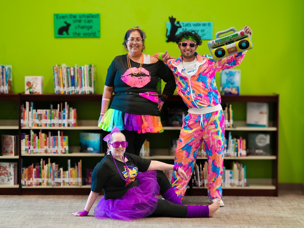 Three 80's partygoers