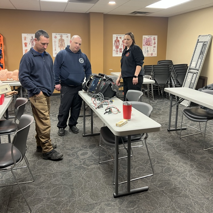 Fire/EMS Staff reviewing medications and cardiac monitor training.