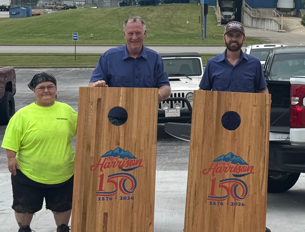 Cornhole boards being moved