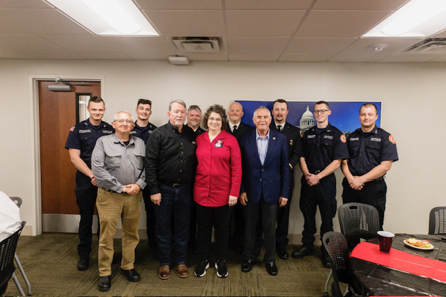 A group of active and retired firefighters joined Mollie McCammon in Little Rock.