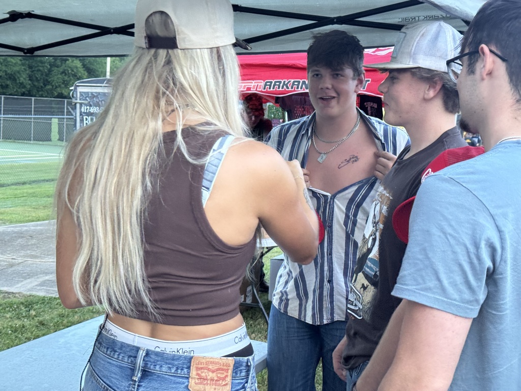 He's proud of that chest autograph