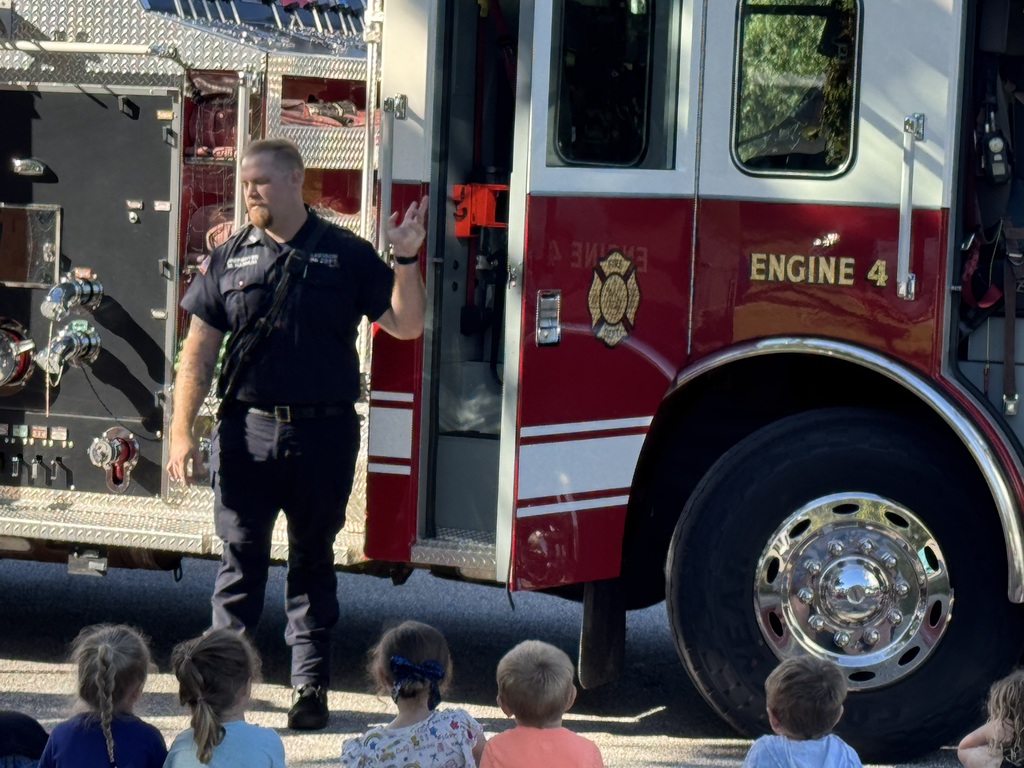 Firefighters speaking to students