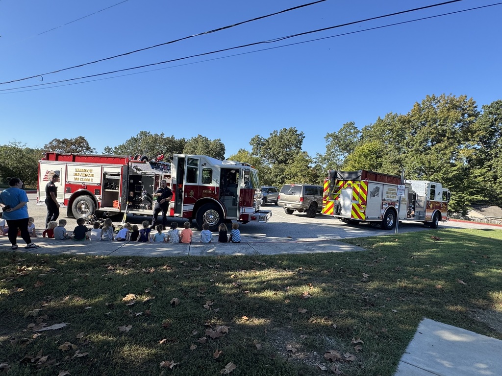 Firefighters speaking to students
