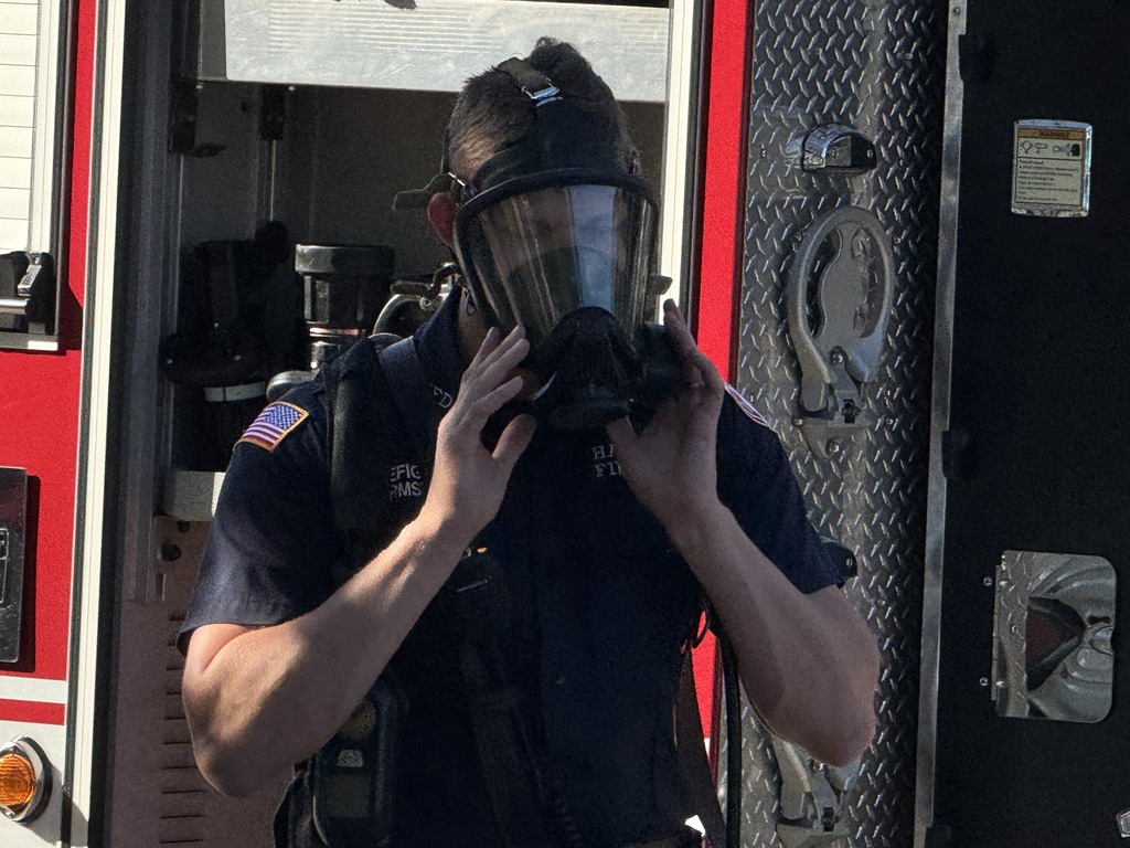 Firefighters speaking to students