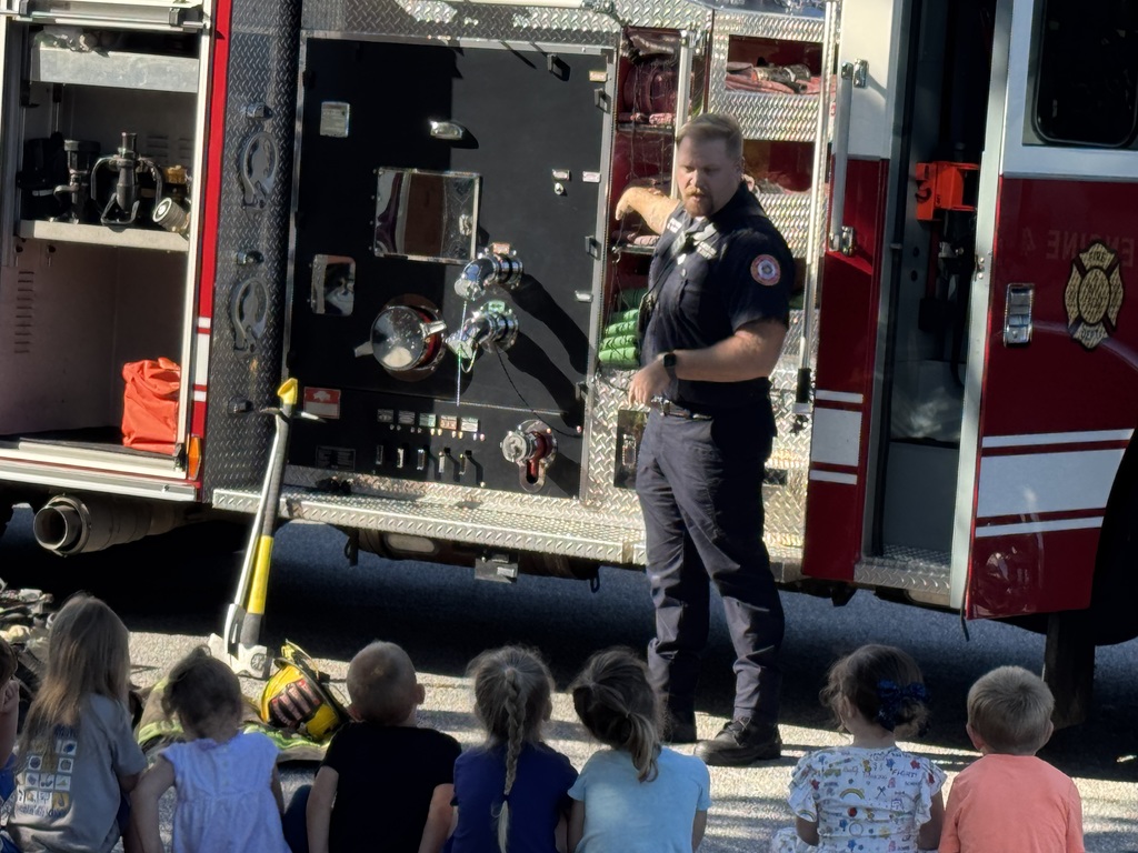Firefighters speaking to students