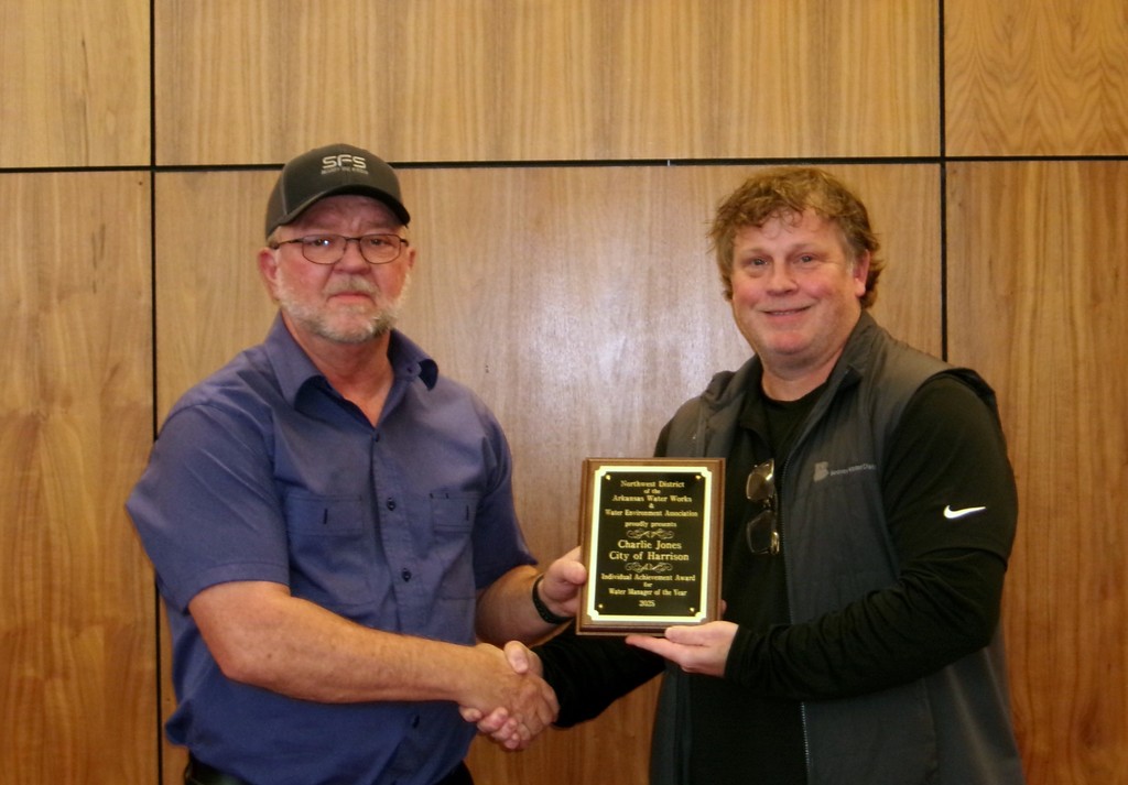 Charlie Jones accepting an award