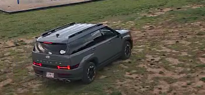 Vehicle driving through Braden Park