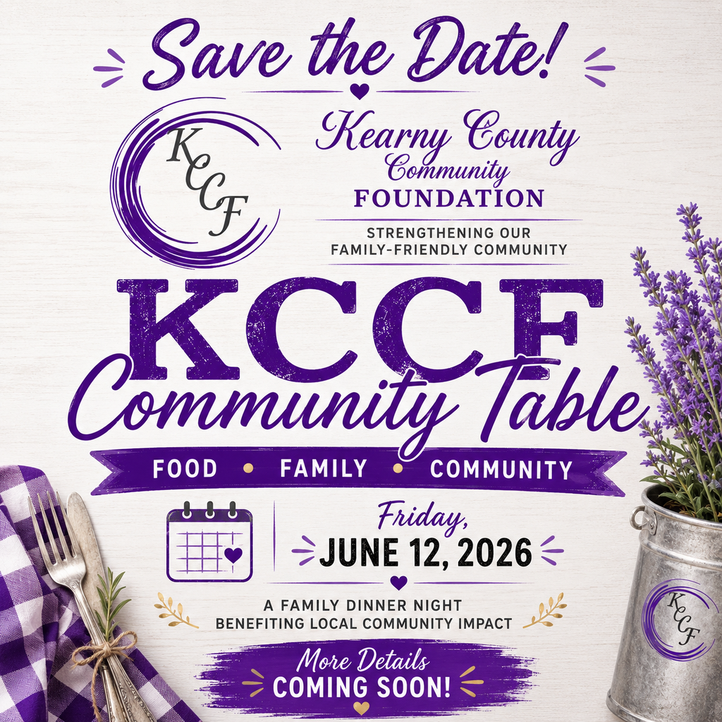 Save the Date graphic for the Kearny County Community Foundation. The design features a rustic white wood background with purple accents and the KCCF logo. Large text reads “Save the Date!” and “KCCF Community Table” with the tagline “Food • Family • Community.” Event details include Friday, June 12, 2026, and the phrase “A Family Dinner Night Benefiting Local Community Impact.” A banner at the bottom reads “More Details Coming Soon!” Decorative elements include lavender flowers, a purple gingham cloth, silverware, and a galvanized bucket featuring the KCCF logo. The foundation’s slogan, “Strengthening Our Family-Friendly Community,” appears near the top.