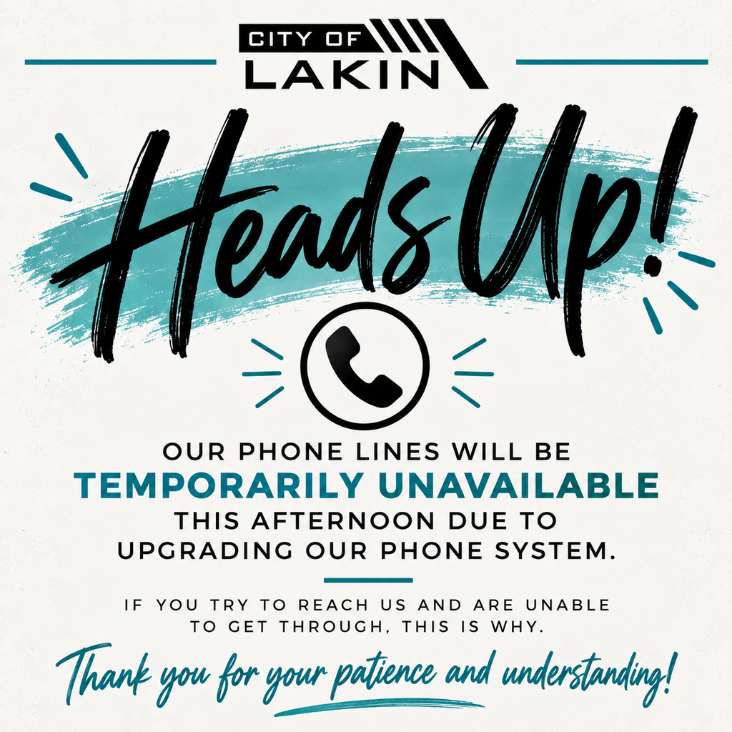 A notice from the City of Lakin. Blue and black text on a white background reads "Heads Up! Our phone lines will be temporarily unavailable this afternoon due to upgrading our phone system."
