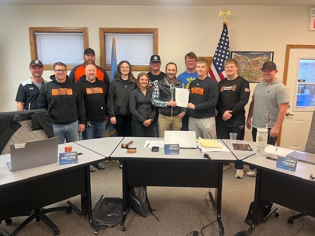 Lennox Orioles Powerlifting Team poses for a photo with Mayor Danny Fergen