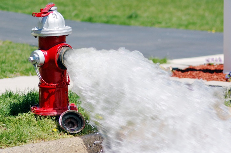 Open running fire hydrant.