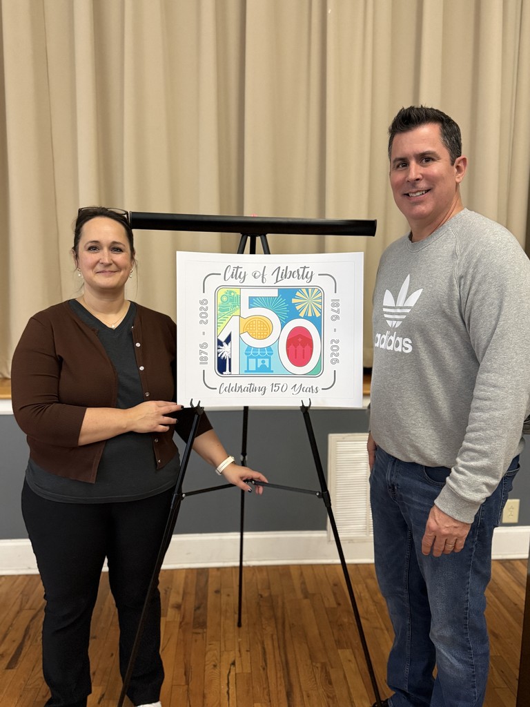 Mayor Wagner and Ryan Chambers with the logo