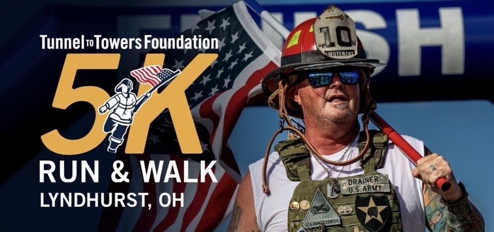 5K event banner with Fire Fighter holding an axe