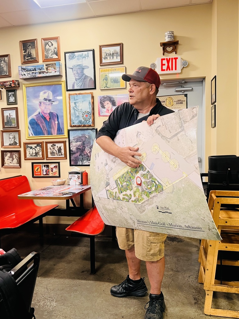 Jeff Tacker holds a site plan for Memaw’s Mini-Golf while discussing the new attraction planned for Marion at Tacker’s Shake Shack.