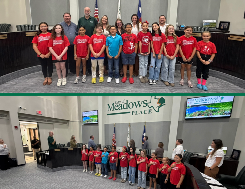 Meadows Elementary National Elementary Honor Society students lead the Pledge of Allegiance to open the Meadows Place City Council meeting. The students are pictured with school representatives and City officials in the Council Chambers.