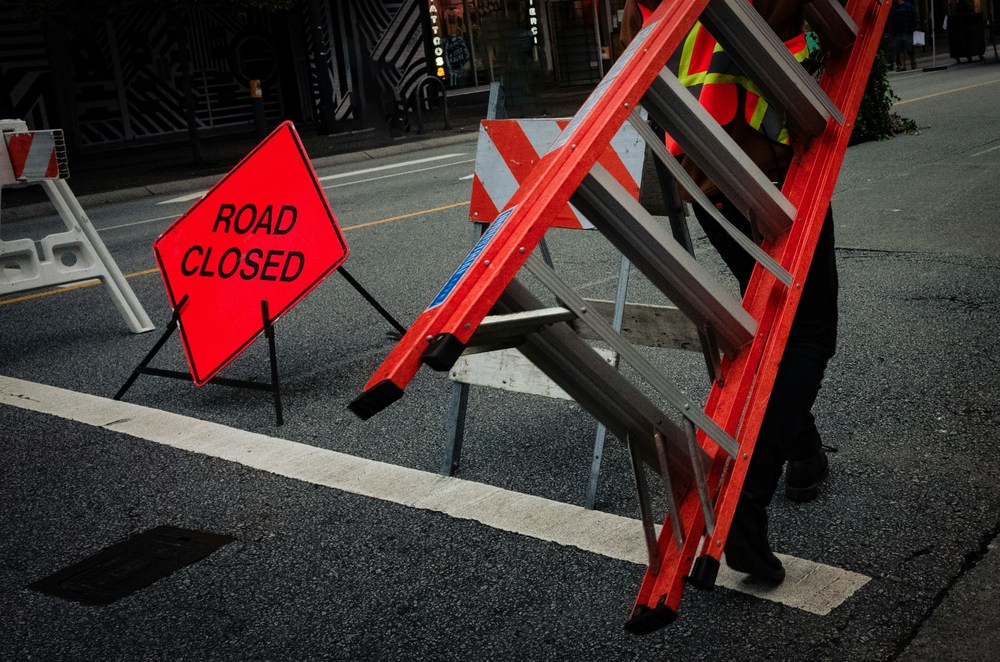 road closed sign and ladder