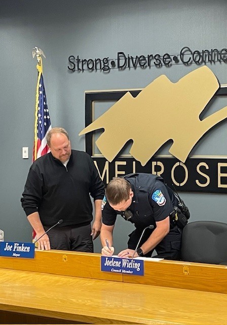 officer host being sworn in
