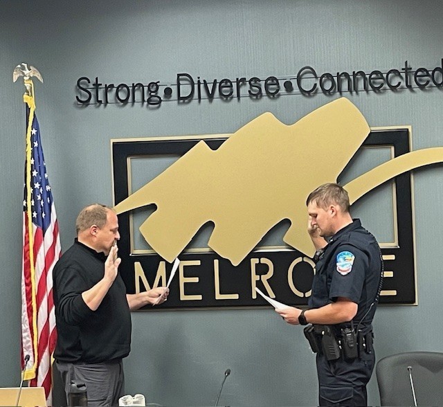officer host being sworn in