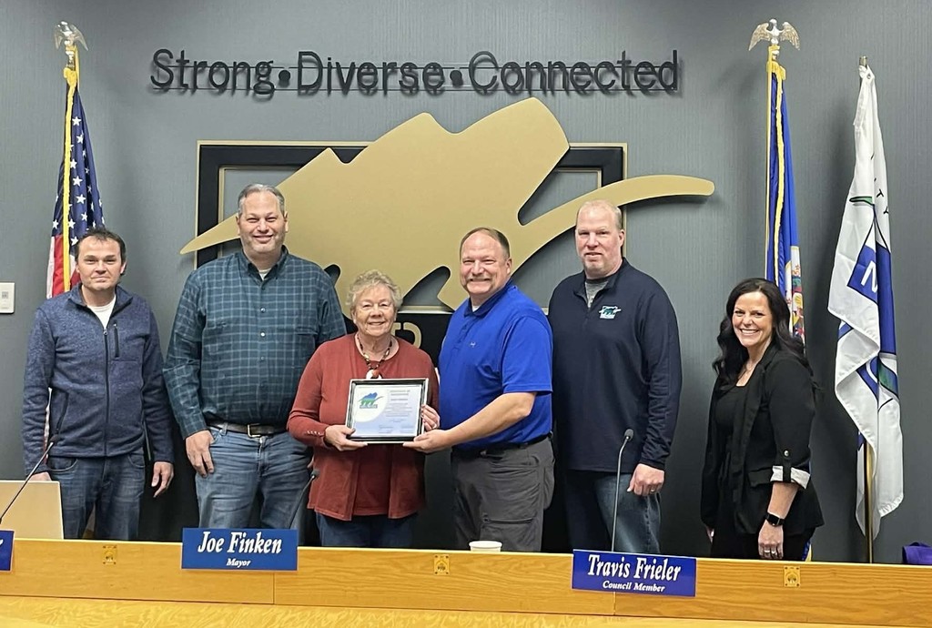 City council members awarding Nancy roering