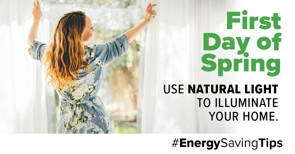 A woman holding curtains