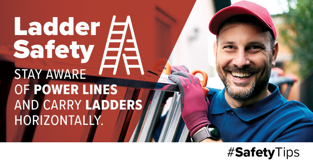 A man holding a ladder