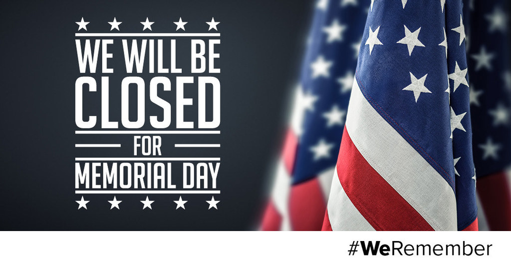 Closed for memorial day sign and american flag