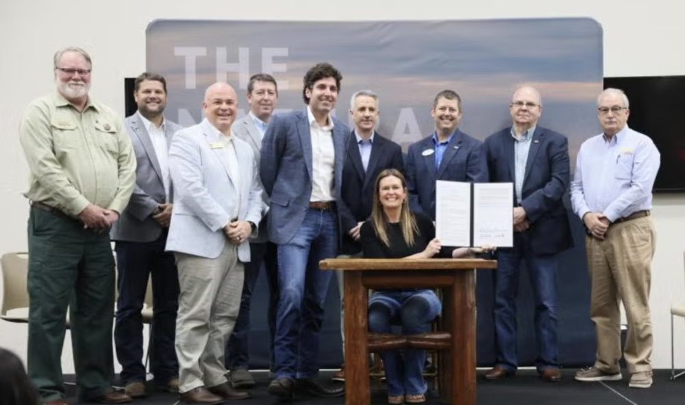 signing of permit for the trails project