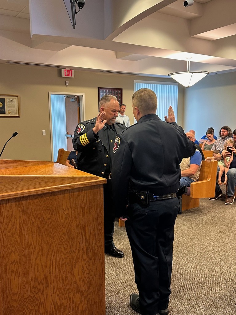 Jake Baker reciting the Oath of Office