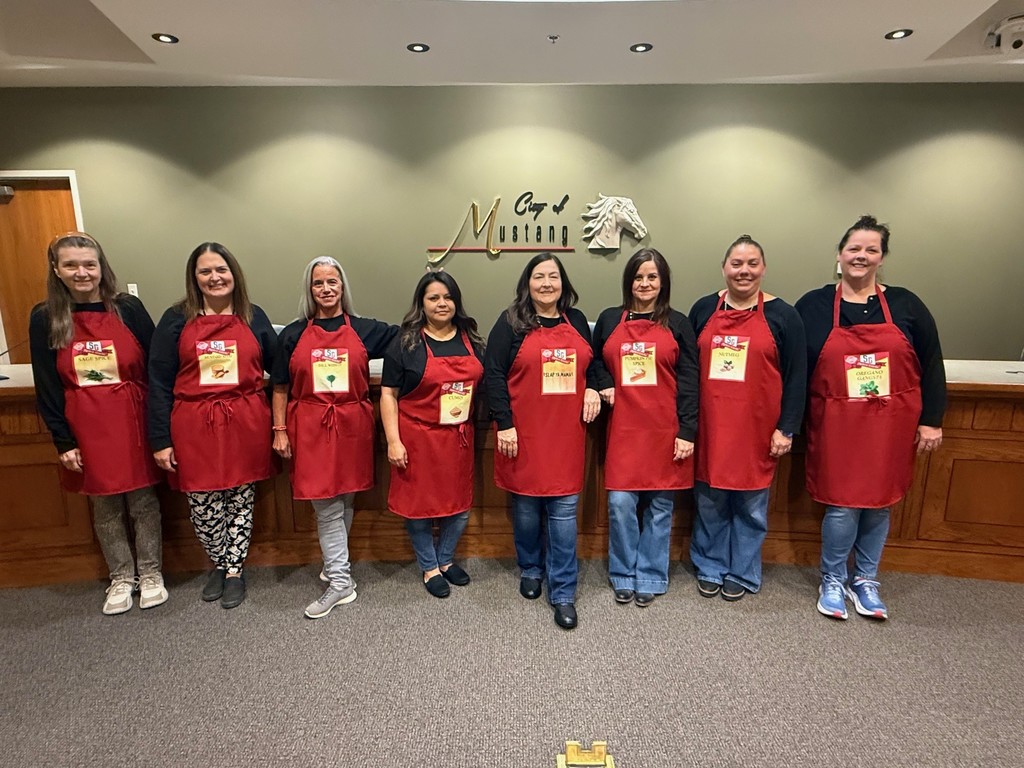 The Finance Department in their Halloween Costumes